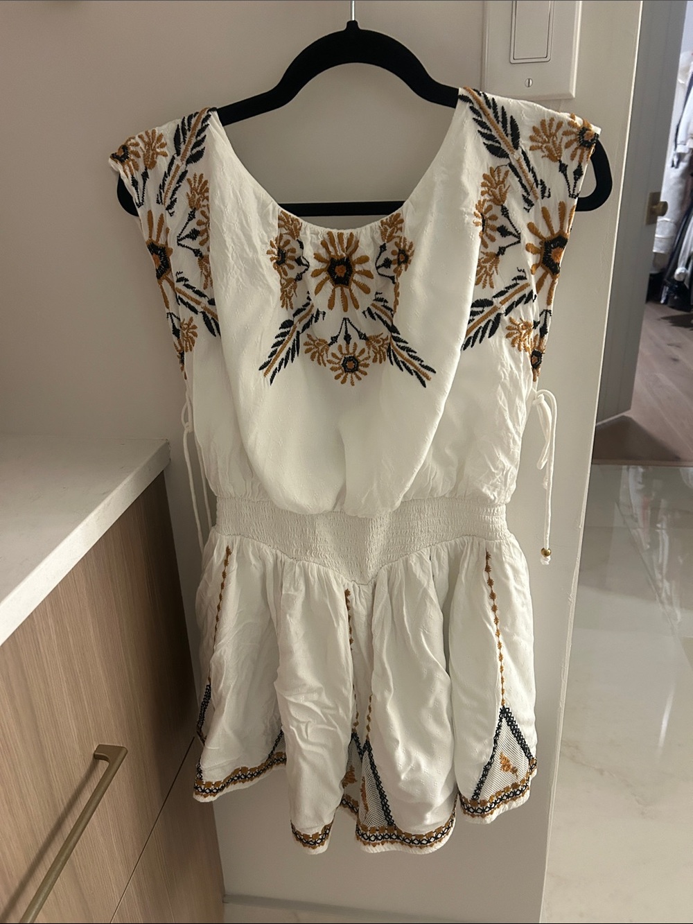 Women's White Embroidered Romper with Gold Floral Detail